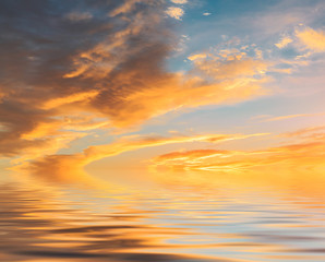 Sky and water reflection scene at dusk