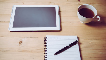 notebook with pen and tablet