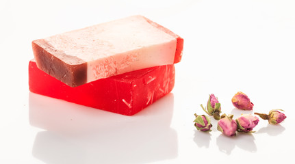 Handmade soap bars on white background