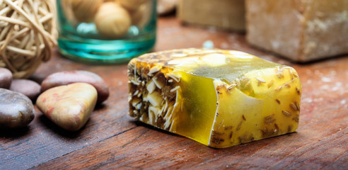 Handmade soap bar on wooden background