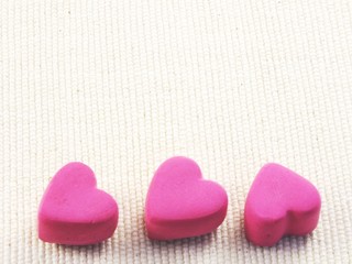 valentine love pink hearts close up top view with copy space