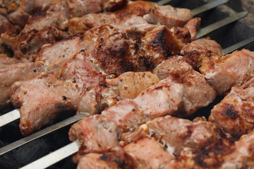 Meat porkis fried on the grill skewers at coals 20452