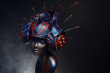 Mannequin in creative head wear with spikes