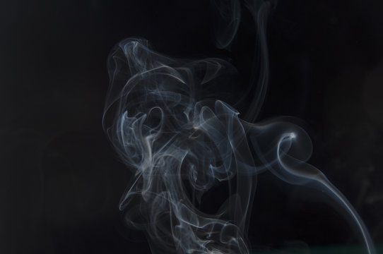 Abstract background with white smoke and black backdrop