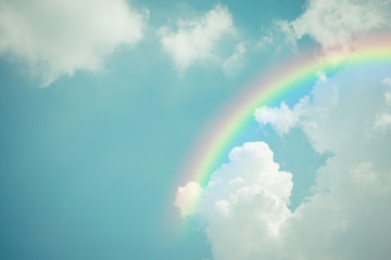 Blue sky cloud with rainbow , process in vintage style