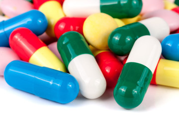 colorful pills isolated on white background