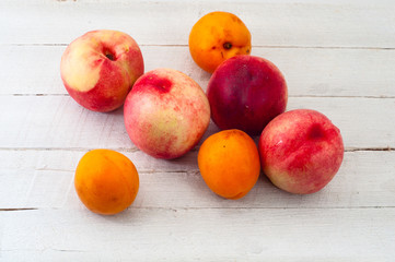heap of sweet peaches on wooden table