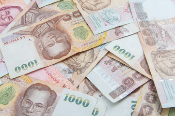 Thailand currency. Thousand banknotes top view background