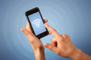 Female hand holding smartphone