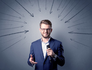 Businessman holding microphone