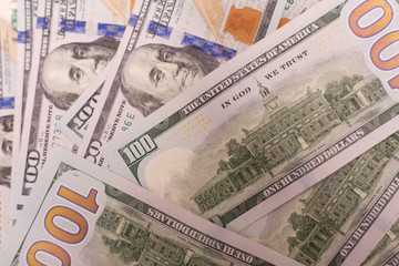 One hundred dollar bills background 