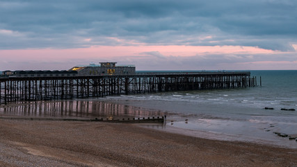 Evening clouds over Hastings Pier, Hastings, East Sussex, UK