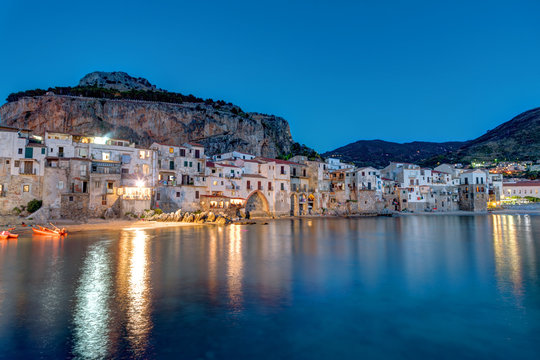 The old town of Cefalu in Sicily after sunset
