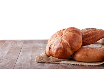 fresh healthy natural bread food group in studio on table isolated on the white background