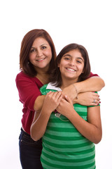 Happy Hispanic mother and daughter.