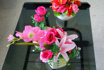 flower in vase ceramic on  the table glass
