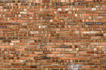 Brick wall in different red shades