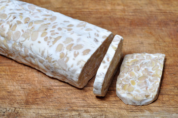 Sliced Fresh Tempeh on Wooden Board