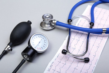 RX prescription, Red heart, asorted pils and a stethoscope on white background