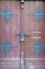 The vintage brown  wooden front door of an old house