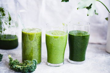 Group of Green smoothie with green fruits and vegetables. Green smoothie glass. Detox, dieting, clean eating, fitness diet concept.