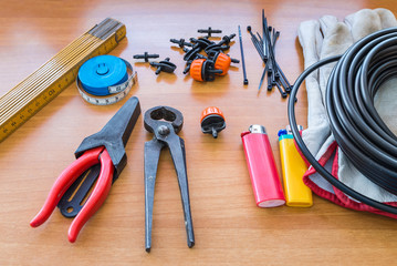 Accessories and materials for completing a  micro drip irrigation system for potted plants on...