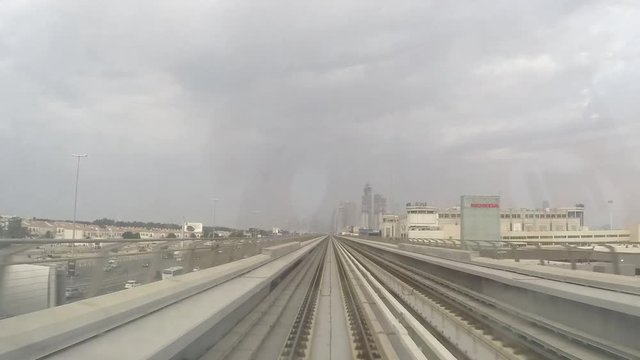 Timelapse video shot on Dubai metro train during a cloudy and gray day