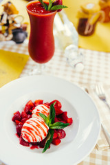 Strawberry ice cream dish with fresh strawberry with fresh juice