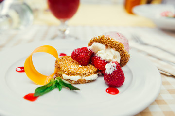 Strawberry ice cream dish with fresh cookie