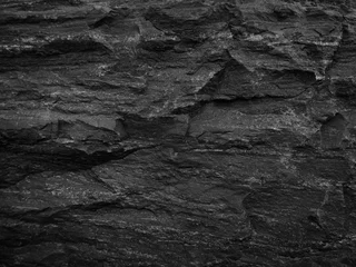 Papier Peint photo Pierres Texture de pierre noire.