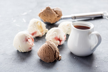 Vanilla and chocolate balls on background Scoop of chocolate ice cream Copy space