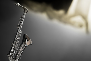 A little saxophone souvenir in silver texture. Filter and effect added.