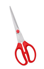 Red scissors on fabric isolated on white