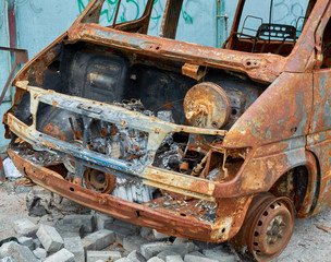 Ruined rusty old burned bus