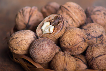 Walnuts close-up, walnuts on a dark background