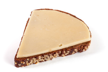 slice of black bread with sesame seeds with cheese isolated on white background