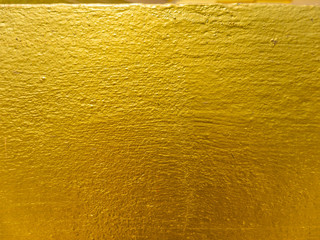 Golden concrete wall pattern close-up shot