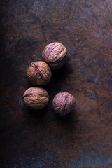 walnuts close-up, walnuts on a dark background