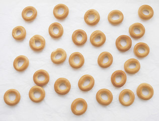 Bagels on a white background. Abstract background with flour products.