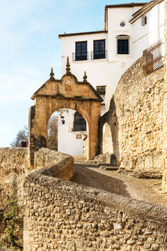 Philip V City Gates (Arch) and city wall in historic Ronda, Spain
