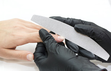 Woman doing manicure beauty salon 