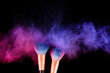 Cosmetics brush and explosion colorful makeup powder