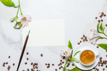 Mockup. Morning romantic breakfast. Coffee, lipstick, blank paper and flowers on marble background....