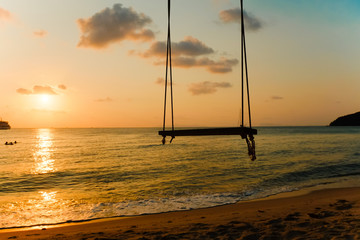 swing on sunset moment