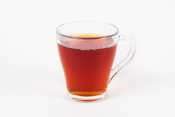 Cup of black tea on white background