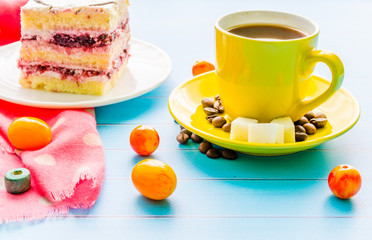 Still life with cup of tea and sweets
