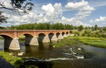 Fototapeta na wymiar Latvia. This is an old bridge over the river 