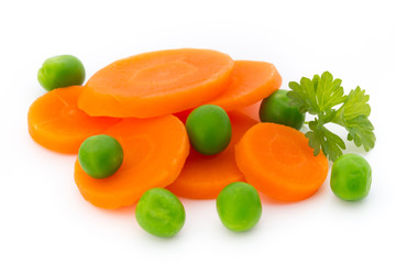 Carrot slice, green peas, isolated on white.