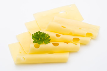 Cheese slices on white background cutout.