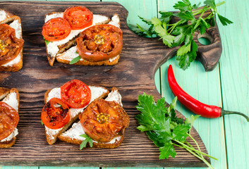 Vegetarian sandwiches and red pepper with parsley.